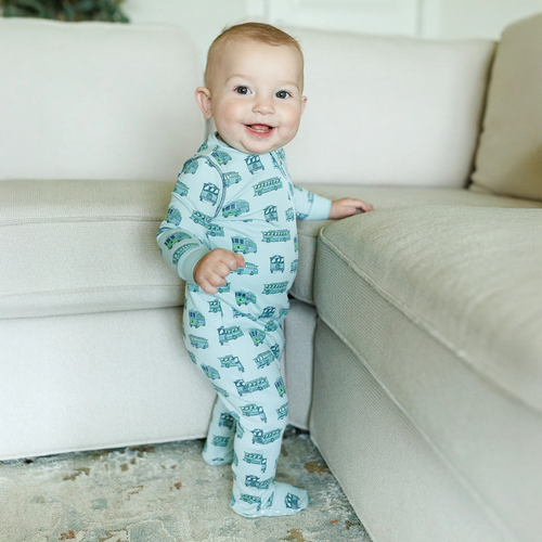  The Tradd Street Trolleys Footed Pajama blends elegance and playful charm, ideal for everyday adventures, imaginative play, and joyful occasions.  

Classic and charming style.
Perfect for playtime, parties, and special moments.
Pima Cotton, Zipper Footie