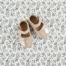 Load image into Gallery viewer, These adorable Mary Jane shoes combine style and comfort for your little one. Featuring soft construction with scalloped edges, extra cushioning in the leather insole, and a breathable lining to keep feet cozy. The supple, natural sheepskin lining adds a luxurious touch. The hook-and-loop strap with a decorative pearled button ensures easy wear. Flexible soles offer support and grip, with a classic Elephantito paw design on the rubber soles.

Soft construction with scalloped edges
Extra cushioning in leathe
