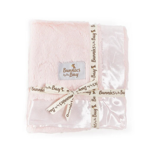 Softness and texture, everything your little snugglers are looking for! This sweet, cuddly blanket, with its nibble fur and satin binding, is perfect for cozy cuddles and comforting moments. Your little one will love snuggling up with this blanket, feeling the gentle touch of the softest fur and the silky satin. Whether it’s bedtime, movie night or just a quiet moment, this blanket is sure to bring comfort and joy. Let the snuggles begin!