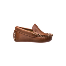 Load image into Gallery viewer, The Elephantito Baby Moccasin epitomizes luxury and craftsmanship in baby footwear. Expertly crafted with fine, full-grain leather uppers and hand-stitching, this moccasin is a work of art. Every detail, from the brogue leather tongue to the signature &quot;paw&quot; design stamped on the leather sole, has been carefully considered. Designed for comfort and practicality, the cushioned footbeds support your baby&#39;s developing feet, while the absorbent leather lining keeps them dry and comfortable. The slip-on design en
