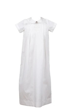 The Proper Peony baptism gown is simple and beautiful. A classic look for any baptism occasion, gown features a hand-sewn cross on the chest in white. Lined and buttons on back.