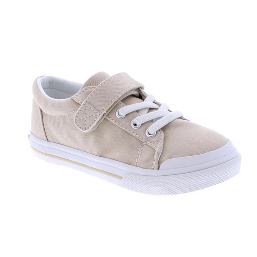 Introducing Footmates Jordan in Stone, the perfect canvas shoe loved by moms and kids alike. With its Velcro closure, this Footmates shoe is both stylish and convenient, making it a favorite for all ages. Add it to your shoe collection today!