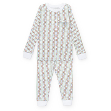 Load image into Gallery viewer, Experience cozy comfort with the Bradford Boys&#39; Pajama Pant Set from Lila &amp; Hayes. Crafted from 100% soft Peruvian Pima cotton, this long-sleeved top and elastic-waist pant set offers a snug, safe fit without flame retardants. The top features a charming pocket with white piping, while the nutcracker stripe adds classic style. Designed with care, these pajamas ensure both comfort and peace of mind for your little one’s bedtime.
