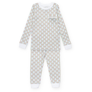 Experience cozy comfort with the Bradford Boys' Pajama Pant Set from Lila &amp; Hayes. Crafted from 100% soft Peruvian Pima cotton, this long-sleeved top and elastic-waist pant set offers a snug, safe fit without flame retardants. The top features a charming pocket with white piping, while the nutcracker stripe adds classic style. Designed with care, these pajamas ensure both comfort and peace of mind for your little one’s bedtime.