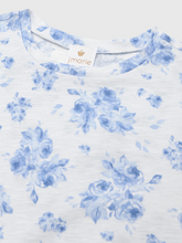 Load image into Gallery viewer, The Girls Nicole Slouch Tee from J. Marie brings effortless style to her everyday wardrobe. Featuring a charming floral print on a relaxed slouch silhouette, this tee is designed for the modern tween who loves comfort without compromising on trend. The laid-back fit pairs perfectly with the Nicole Athletic Skirt for a coordinated floral look, or works beautifully on its own with her favorite bottoms. Versatile, comfortable, and on-trend—this tee is ready for everything from school days to weekend adventures
