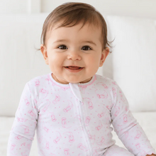 Load image into Gallery viewer, Introduce your little cowgirl to comfort and style with the Infant Girls Darling Cowboy Playsuit from Magnolia Baby. Crafted from soft Pima cotton, this charming one-piece features an adorable pink cowgirl boots. The convenient 2-way zipper makes diaper changes and dressing effortless, so you can keep up with her busy day. Perfect for everything from naptime cuddles to playtime adventures.

