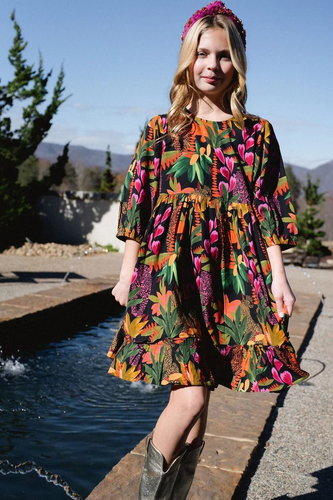 Introducing our Ollie Beaded Girls Dress: the perfect blend of style and comfort. Featuring a beautiful neckline and a soft cotton fabric, this dress also boasts a custom fall print. Get ready to turn heads and make a statement with this dress!