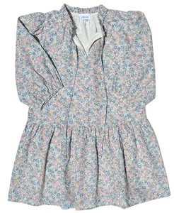 Introducing the stunning Eve Dress English Garden from Pleat. Featuring a gorgeous green and blue floral print, a flattering v-neck, a trendy drop waist, and charming puffy sleeves. This dress is a must-have for any stylish tween girl this Spring. Upgrade her wardrobe with this must-have piece!