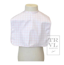 Load image into Gallery viewer, Your little ones will look super cute at meal and snack time with our&nbsp;TRVL Best Bib.&nbsp;Our full coverage bib snaps at the back of the neck and in the front you snap to invert a catchall pocket. The material is so soft that you can gently use to wipe their faces. Easy to wipe clean or simply place in your washing machine and hang dry. Comes packed in a cute cotton drawstring bag for easy display and storage.
