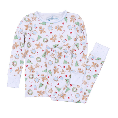 Dress your little one in cozy comfort and festive charm with this Boy's Frosted Wonderland Long Pajama Set . Made from 100% soft, breathable Pima Cotton, it gently caresses delicate skin while keeping your little one comfortable all day. The delightful all-over print of gingerbread boys, stars, and snowflakes adds a sweet holiday touch, making it the perfect choice for seasonal celebrations and cozy winter moments. Sibling matches available!