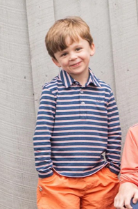 Meet your new favorite classic: the Boys Long Sleeve Polo - Denim &amp; Crabapple. Designed from a premium blend of cotton and spandex for all-day comfort and just the right amount of stretch. Whether he's headed to church, school, or the golf course with Dad, this polo allows him to look polished and playful at the same time. Plus, it's proudly made in Peru, known for its high-quality cotton production.