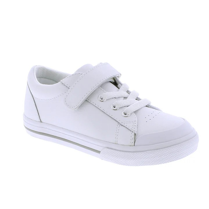 Footmates Reese White Leather Sneaker- Leather blucher oxford vulcanized sneaker featuring hook-and-loop closure and decorative elasticized false-laces.
Custom Fit System – Removable, dual insoles in Medium and Wide provided for customized fitting.
Roomy Toe Box – Allows tiny toes room to breathe and splay naturally during walking, enhancing balance and reducing rubbing, friction, and moisture.
Arch Support – Shoe last and insole designed to provide proper arch support for developing feet.
Firm He