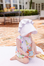 Load image into Gallery viewer, The Beaufort Bonnet in Worth Avenue White is simple and sweet. It is a staple for any darling little girl&#39;s wardrobe. Not only does it provide some shade for those cheeks you love so much, but it looks absolutely precious with any outfit too!
