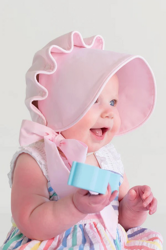 It's precious!!! The Beaufort Bonnet in Palm Beach Pink is soft, sweet, and looks darling with everything.  Every baby girl needs a baby pink baby bonnet! Don't forget, Beaufort Bonnets are made to be worn.

Call or email us to order: