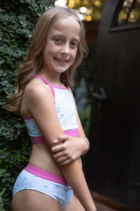 PRODOH&nbsp;Girls Racerback Bikini in Palm Tree Stripe Print&nbsp;is a classic swim style for active girls who love adventure and that coastal lifestyle! Pill and fade resistant to last several seasons so you'll be able to pass down to others...keeping your outdoor traditions alive.&nbsp;

UPF 50+ 82% Nylon 18% Spandex
100% Polyester Lining
Pill and Fade Resistant
Adjustable Bikini Top
Designed in USA and Imported