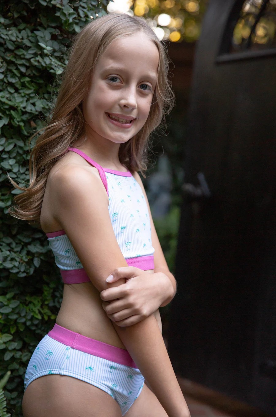 PRODOH Girls Racerback Bikini in Palm Tree Stripe Print is a classic swim style for active girls who love adventure and that coastal lifestyle! Pill and fade resistant to last several seasons so you'll be able to pass down to others...keeping your outdoor traditions alive. 

UPF 50+ 82% Nylon 18% Spandex
100% Polyester Lining
Pill and Fade Resistant
Adjustable Bikini Top
Designed in USA and Imported