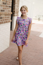 Load image into Gallery viewer, Elevate your little one&#39;s style with the Girls Sophia Dress in Lilac. Crafted by Briton Court, this charming dress features a whimsical hen and rooster print and playful ruffle sleeves. Made with 100% cotton, it&#39;s both comfortable and stylish for any occasion. Machine washable for easy care.
