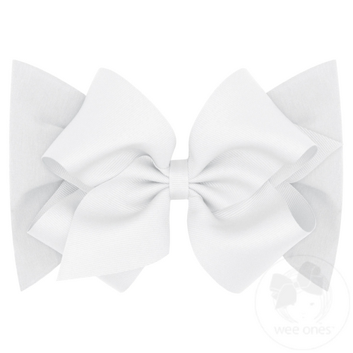 Our small king classic grosgrain bow is now perfect for baby with our matching soft cotton jersey band. Available in light pink and white.
Approximate Size: 5.5” x 4” (2.25” Ribbon)