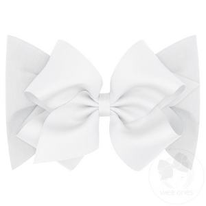 Our small king classic grosgrain bow is now perfect for baby with our matching soft cotton jersey band. Available in light pink and white.
Approximate Size: 5.5” x 4” (2.25” Ribbon)