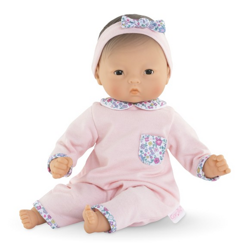 Bébé Calin Mila is a 12-inch baby doll that is perfectly sized to be cradled in a young child's arms and is ideal for hugging and cuddling. Her face, arms and legs are made of touchably soft vinyl that is delicately scented with vanilla -- a Corolle signature -- so that the hugs children give their doll are as sweet and memorable as the hugs their parents give them.

Bébé Calin Mila's soft body is posable like a real baby. She has dark brown sleepy eyes that close when she's put down for a nap or at bedtime