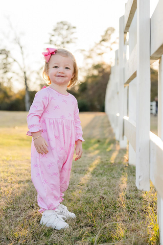 Dress your little one in the Simply Sweet Knit Isla Long Bubble, a charming pink long-sleeve outfit perfect for infant girls. Featuring an adorable pink bow print and a real pink bow on the back, it adds a playful and delicate touch to your baby's wardrobe. Soft and cozy, this bubble romper keeps your infant comfortable while looking absolutely delightful.