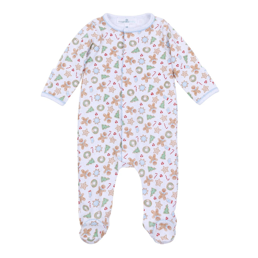 Dress your baby boy in cozy comfort and festive charm with this Frosted Wonderland footie. Made from 100% soft, breathable Pima Cotton, it gently caresses delicate skin while keeping your little one comfortable all day. The delightful all-over print of gingerbread girls, stars, and snowflakes adds a sweet holiday touch, making it the perfect choice for seasonal celebrations and cozy winter moments. Sibling matches available!