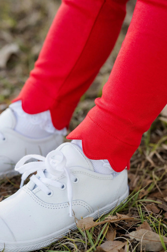 Girls Full Bloom Red Scallop Leggings are a must-have for her wardrobe, offering both comfort and style. Their vibrant red scalloped design adds a playful touch that pairs beautifully with the Full Bloom Sweatshirt for a cozy, fashionable fall outfit. Perfect for everyday wear, these leggings bring both practicality and charm to her seasonal looks.