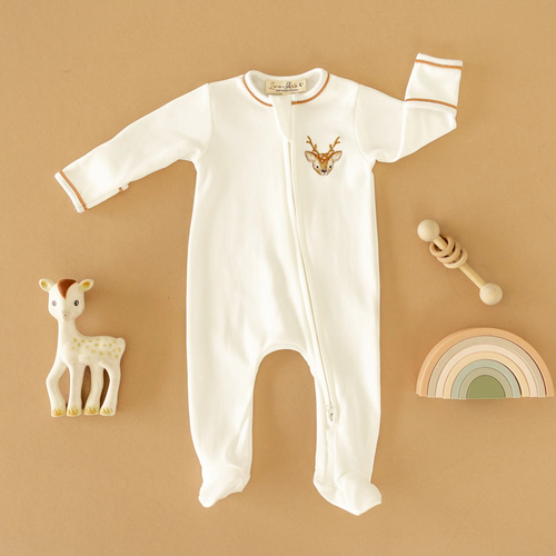 Dress your little one in the Luna & Arlo Buckhead Zipper Footie for unmatched comfort and style. Crafted from 100% luxurious Pima Cotton, this soft, breathable fabric keeps delicate skin happy all day long. The footie features a cozy fit that moves with your child, while the hand-embroidered buckhead adds a charming, artisanal detail. Perfect for playdates or bed time, this footie offers both comfort and a unique touch that stands out.