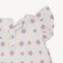 Load image into Gallery viewer, The Magnetic Me Lilac Embroidered Cotton Dress is perfectly fit for a fashionista with an empire waist and a flowy silhouette. when getting dressed presents its challenges, reach for this—magnetic closures make pulling it over the head much more manageable. crafted from 100% organic cotton, it&#39;s designed to hold up for special occasions and roughing around.&nbsp;
