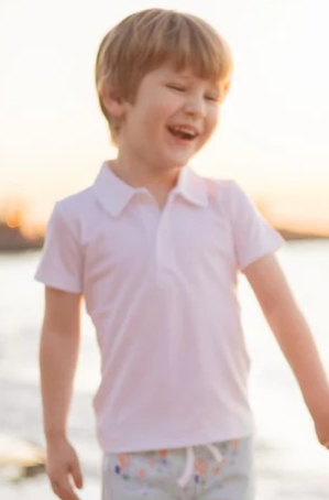 Elevate your little one's style with our Boys Pima White Polo from The Proper Peony! Made with high-quality Pima cotton, this polo is perfect for your toddler's comfort and style. Complete the look with our Hoppy Shorts or other adorable short styles. Dressing up has never been easier or cuter!