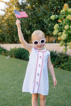 Load image into Gallery viewer, The 4th of July never looked so proper! Our Revere Fireworks Dress from The Proper Peony for toddler girls is ready for every patriotic day and all the days between, too. Red, white and blue is perfect all summer long. Designed with timeless elegance and playful spirit, this dress captures the essence of classic American style in a silhouette that's both comfortable and refined.
