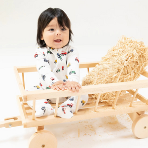 Mini Tractors 2 Way Zipper Footie from Angel Dear. The Signature zipper footie&nbsp;makes changing your baby a Snap! (or as we like to say a Zip!) Super soft viscose from bamboo fabric and Angel Dear's signature prints will keep the oohs and aahs a- coming.