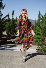 Load image into Gallery viewer, Introducing our Ollie Beaded Girls Dress: the perfect blend of style and comfort. Featuring a beautiful neckline and a soft cotton fabric, this dress also boasts a custom fall print. Get ready to turn heads and make a statement with this dress!
