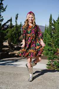 Introducing our Ollie Beaded Girls Dress: the perfect blend of style and comfort. Featuring a beautiful neckline and a soft cotton fabric, this dress also boasts a custom fall print. Get ready to turn heads and make a statement with this dress!