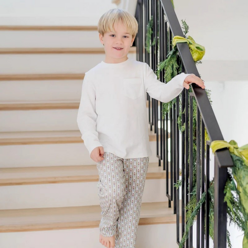 The Beckett Boys' Hangout Pant in Nutcracker Stripe by Lila & Hayes offers comfort with a convenient drawstring waistband. Crafted from 100% Peruvian cotton, these pants are soft and durable. These pants make the perfect holiday loungewear!