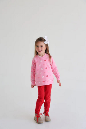 Cassidy Comfy Crewneck featuring Bitty Bows with Hamptons Hot Pink is perfect for seasonal everyday wear. Your little ones will love how soft & warm this crewneck is, and you'll love how practical it looks!