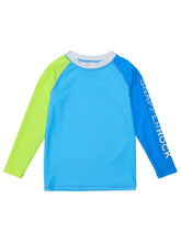 Load image into Gallery viewer, Introduce your toddler boy to the joys of water play with this vibrant color-block rash guard swim top. Featuring a light blue body, blue and citron sleeves, and a white collar, this top is both stylish and functional. Designed by SnapperRock, this top offers sun protection while allowing for full range of motion. Complete the look with the matching Citron Swim Shorts for endless adventures in the sun!
