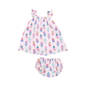 Embrace the joy of summer with the Girls Floral Popsicles Sundress from Angel Dear. Made with super soft muslin, this dress features a playful print of floral popsicles, perfect for a day at the beach. Stay cool and stylish with this must-have summer dress. Infant sizes to 24m include bloomers.