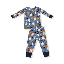 Load image into Gallery viewer, Dress your little one in spooky style with the Costumed Ghosts - L/s Loungewear Set from Angel Dear. Made from soft bamboo fabric, this cozy set features a playful ghost print that glows in the dark, adding magical fun to nighttime. Perfect for Halloween or any chilly evening, this footie keeps comfort and festive spirit glowing all night long.
