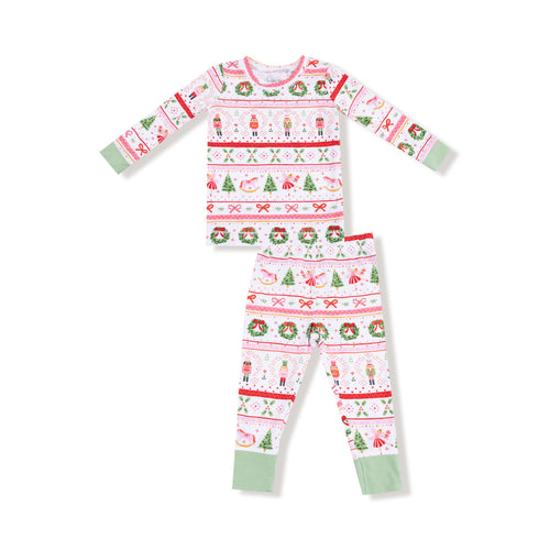 Celebrate the holidays in cozy style with the Girls Sugar Plum Fairy - Nutcracker Fair Isle - Pink Pajama Set by Angel Dear. Featuring a timeless fair isle pattern with festive feminine pink Nutcracker and holiday motifs, this long sleeve set is perfect for creating picture-perfect sibling moments on Christmas morning. 