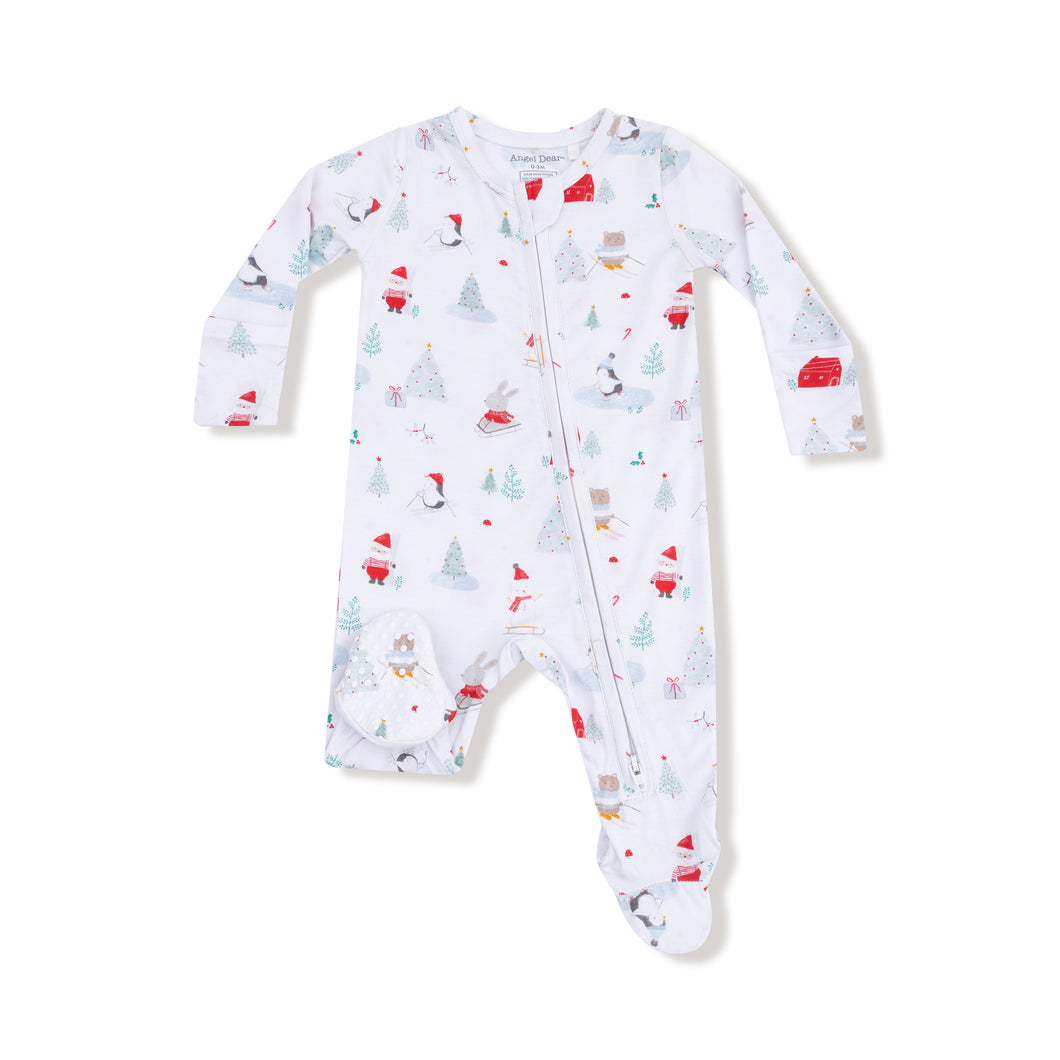 Keep your little one snug and cozy this Holiday season with the Santa Ski Friends 2 Way Zipper Footie from Angel Dear. Made from soft bamboo fabric, these pajamas feature playful skiing Santa & friends that add a touch of fun to bedtime. The convenient 2-way zipper makes dressing and diaper changes easy, while the warm material ensures comfort throughout chilly nights. Perfect for winter, these footed pajamas combine practicality and charm for peaceful sleep and happy dreams.