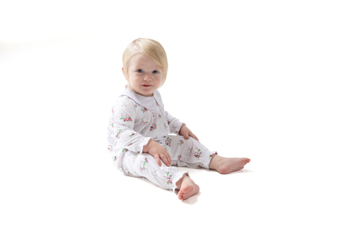 Dress your little one in comfort and style with the Baby Girl Golf Carts Pink Smocked Romper from Angel Dear. Made from soft, breathable 100% bamboo fabric, this long-sleeve romper keeps your baby cozy all day. The charming smocked detail and golf print adds a playful, classic touch that’s perfect for any occasion.