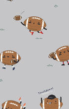 Load image into Gallery viewer, Keep your little one cozy and comfortable all night with the Footballs Playing Football 2 Way Zipper Footie by Angel Dear. Made from soft, stretchy bamboo fabric, this footie offers gentle flexibility for easy movement and restful sleep. The playful football print adds a fun, sporty touch that your child will love. Designed with a convenient two-way zipper, changing is quick and hassle-free.&nbsp;
