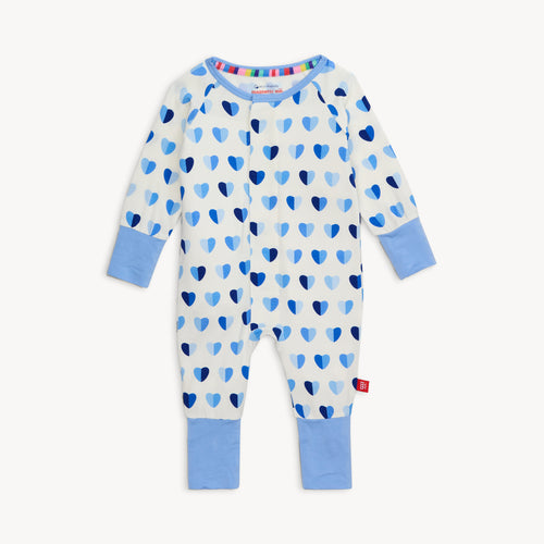 Blue XOXO Hearts Modal Convertible Coverall from Magnetic Me. Features bright blue hearts and the Magnetic Me's convenient magnet closures. A versatile footie that converts into a coverall, with features to extend the outfit's life.