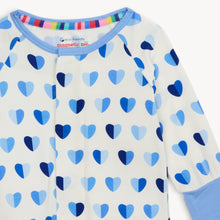 Load image into Gallery viewer, Blue XOXO Hearts Modal Convertible Coverall from Magnetic Me. Features bright blue hearts and the Magnetic Me&#39;s convenient magnet closures. A versatile footie that converts into a coverall, with features to extend the outfit&#39;s life.
