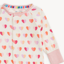 Load image into Gallery viewer, Pink XOXO Hearts Modal Convertible Coverall from Magnetic Me. Features bright blue hearts and the Magnetic Me&#39;s convenient magnet closures.&nbsp;A versatile footie that converts into a coverall, with features to extend the outfit&#39;s life.
