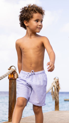 Experience Parisian summer style with these classic swim shorts for toddler boys. The striped design and secure drawcord waist add a touch of sophistication, while the white zippered back pocket keeps essentials safe. Perfect for a summer full of fun and comfort, from SnapperRock.
