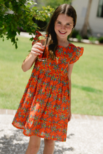 Load image into Gallery viewer, This Girl&#39;s Logal Dress from Briton COurt is a vibrant and fun floral print for summer or a tropical vacation. SHe can be transported away straight to the tropics for any event. SUch a fun and bold dress for any girls this season.
