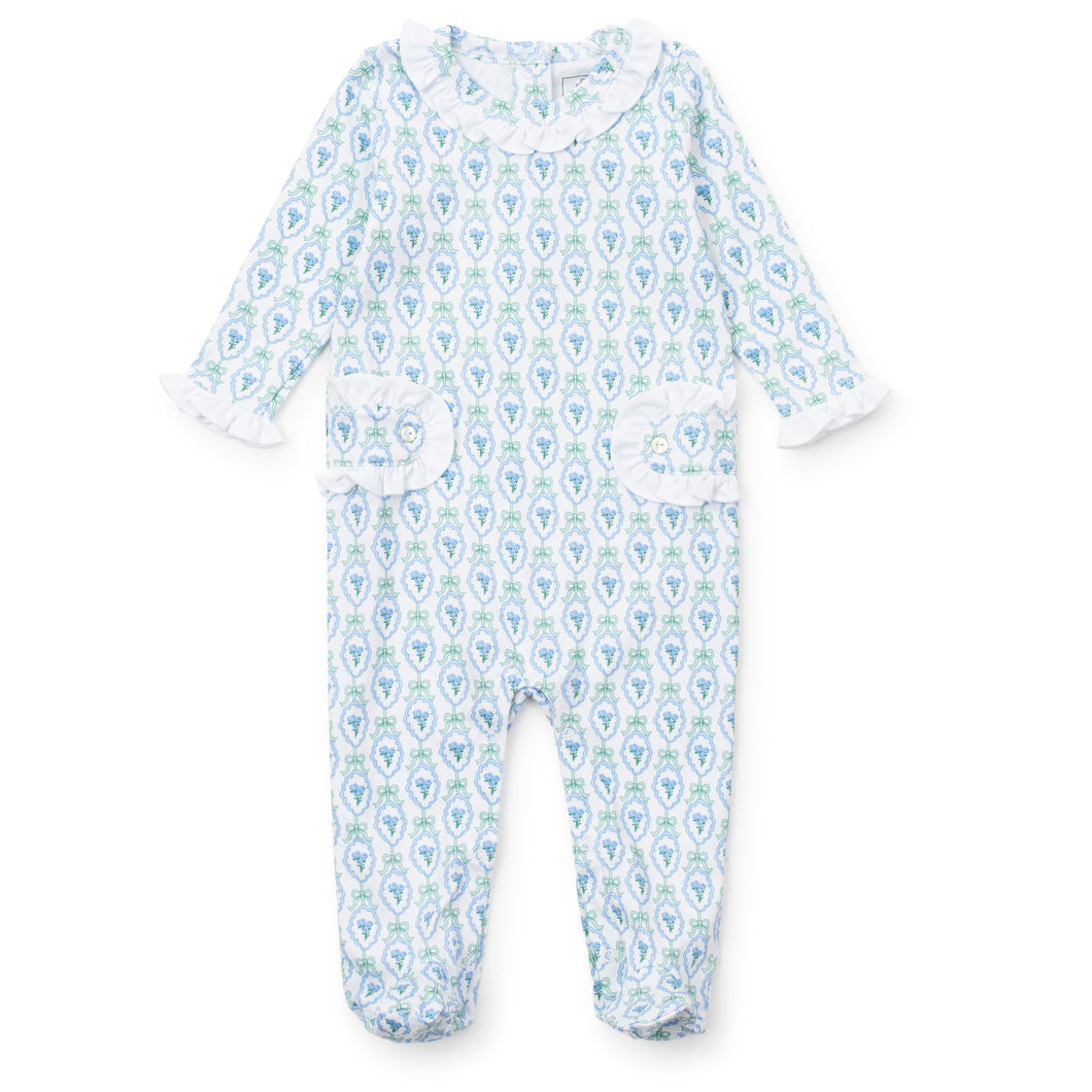 Introducing the Hampton Blooms Ava Romper a must-have for your little one's loungewear and sleepwear collection. With its beautiful Lila & Hayes design, delicate ruffled detailing on the front, and comfy long sleeves, this set is perfect for infant girls. Give your child the gift of comfort and style with this charming pajama romper