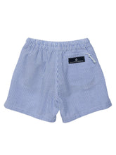 Load image into Gallery viewer, Experience Parisian summer style with these classic swim shorts for toddler boys. The striped design and secure drawcord waist add a touch of sophistication, while the white zippered back pocket keeps essentials safe. Perfect for a summer full of fun and comfort, from SnapperRock.
